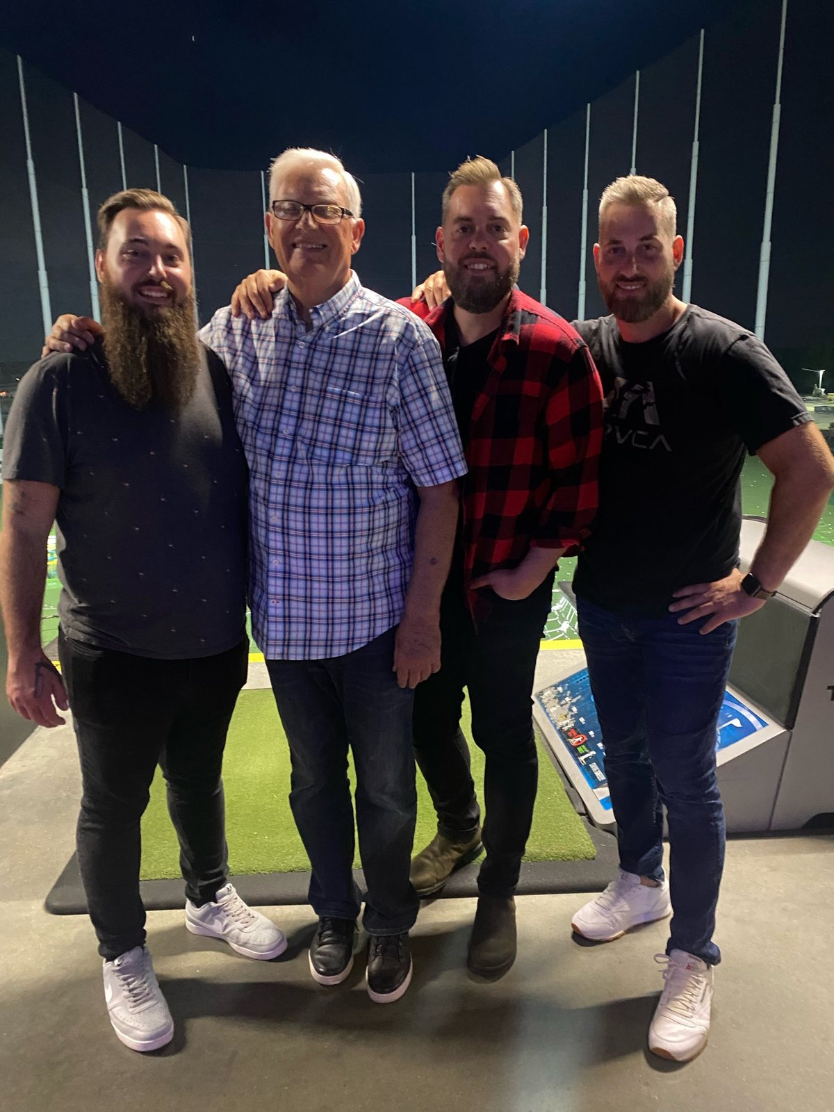 The Powell brothers with their dad